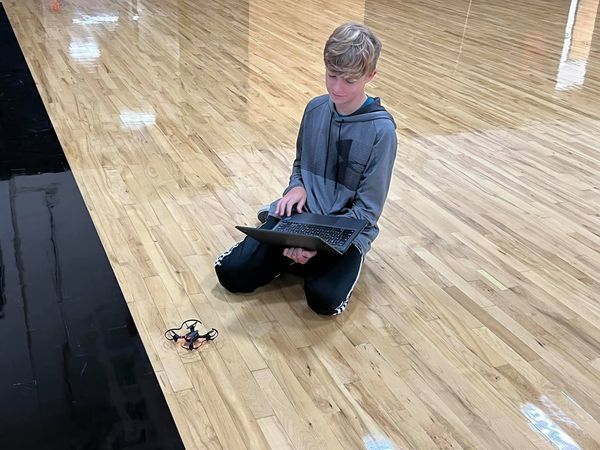 Student coding drone