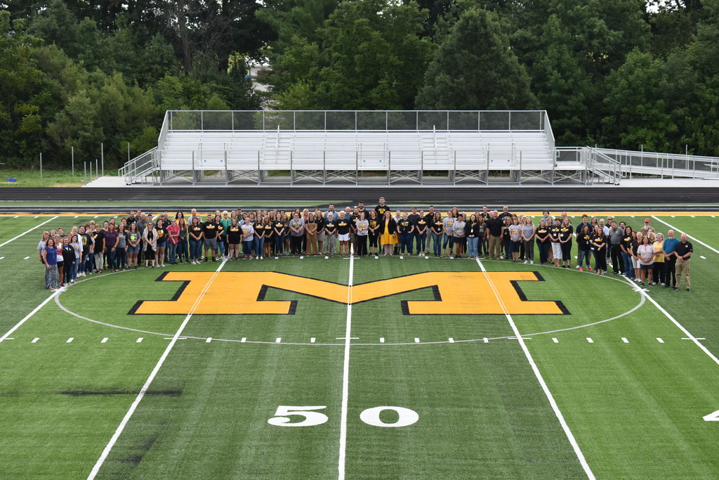Staff on the new field